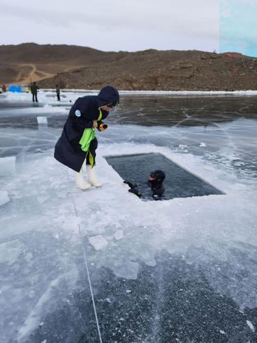 Russian woman who swam under Siberia's ice may have broken the world record