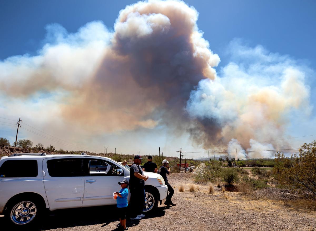 Growth of wildfire north of Tucson halted; evacuation notice remains in