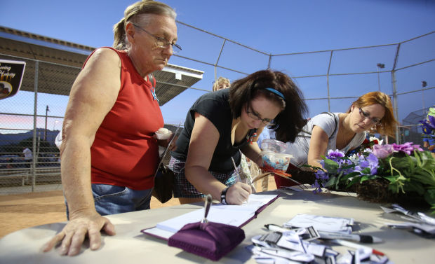Vigil honors slain store clerk