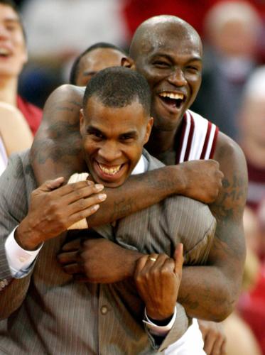 Killingsworth and coach Mike Davis celebrate an Indiana win in Indianapolis