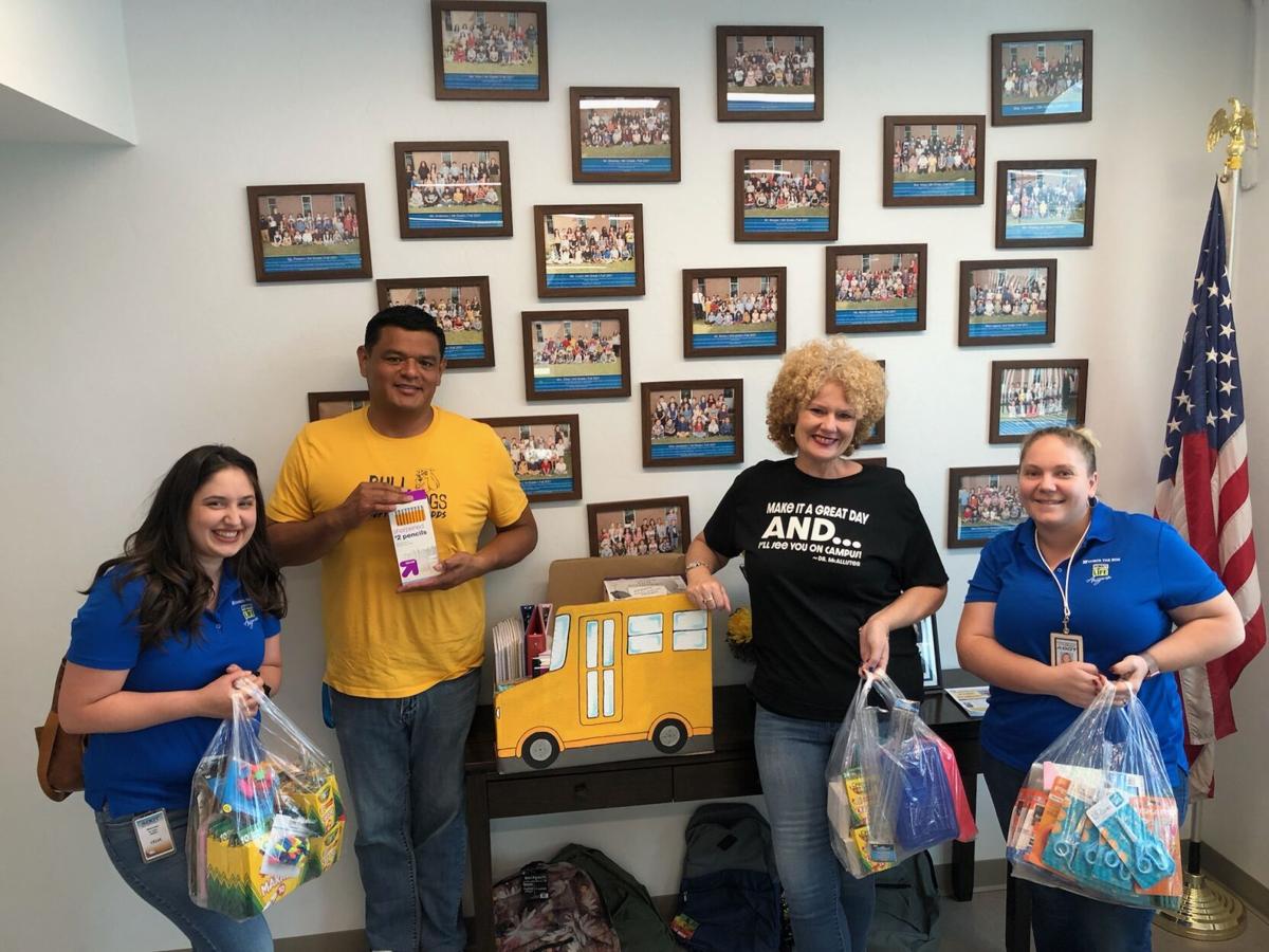 Douglas Elementary receives the school supplies from the Tucson North MVD office.