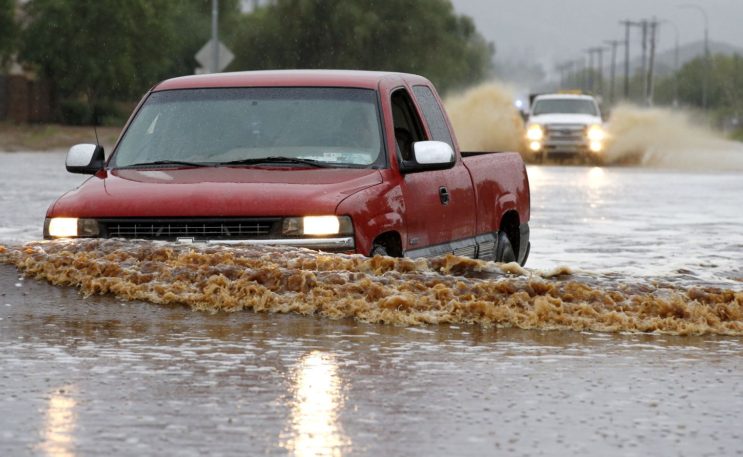 Photos: Arizona Rainfall Floods Phoenix And Breaks Record