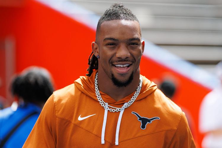 Oct 4, 2025; Gainesville, Florida, USA; Atlanta Falcons running back Bijan Robinson (7) smiles while walking on the field before a game against the Florida Gators at Ben Hill Griffin Stadium. Mandatory Credit: Matt Pendleton-Imagn Images