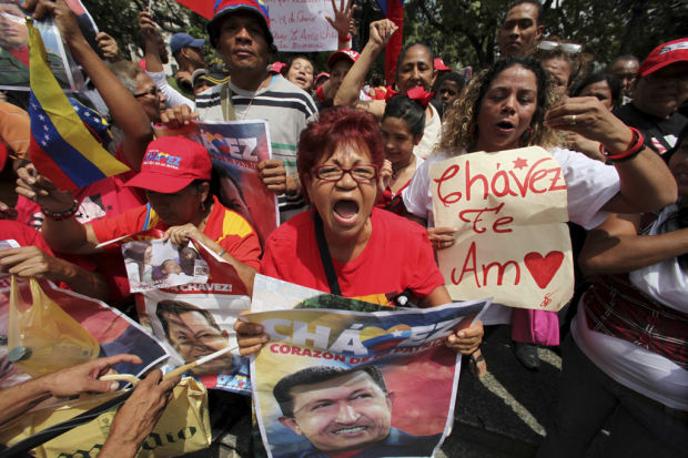 Ailing Chavez back in Venezuela    