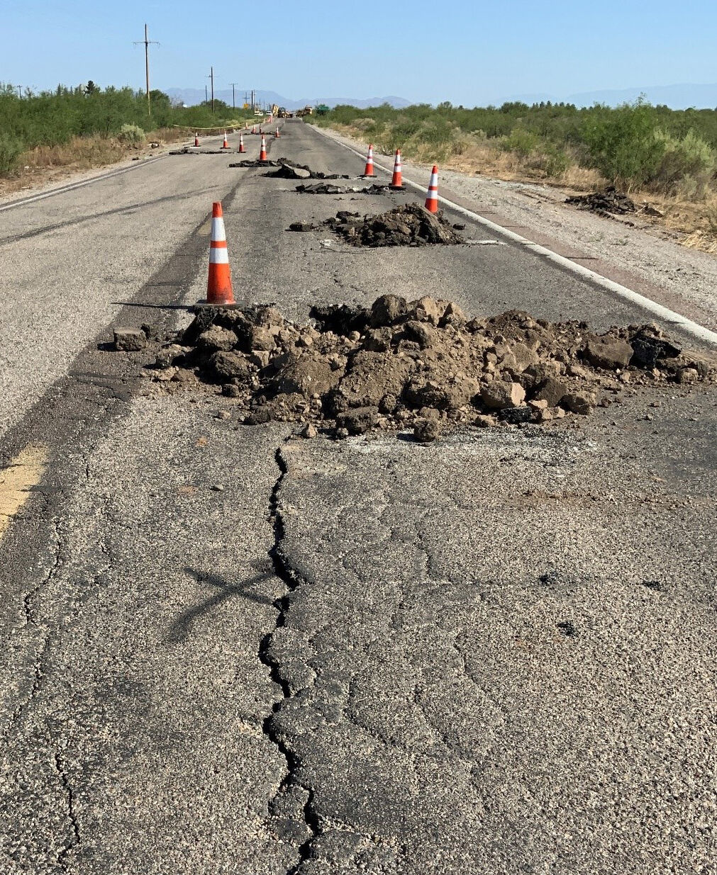 Overpumping causing AZ land to sink dramatically where highway crack ...