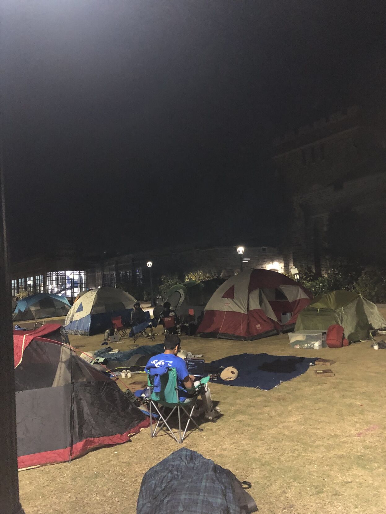 Duke students studying outside Cameron Indoor Stadium
