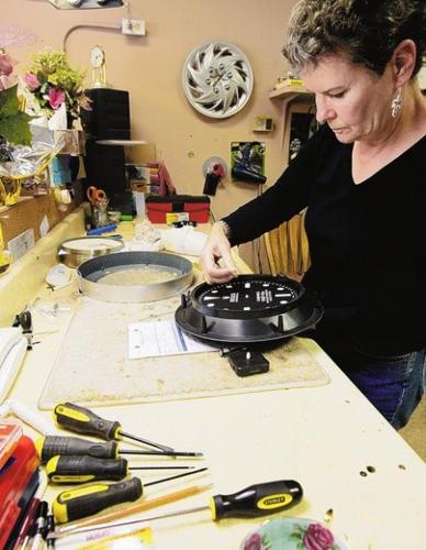Clock shop keeps hands full  