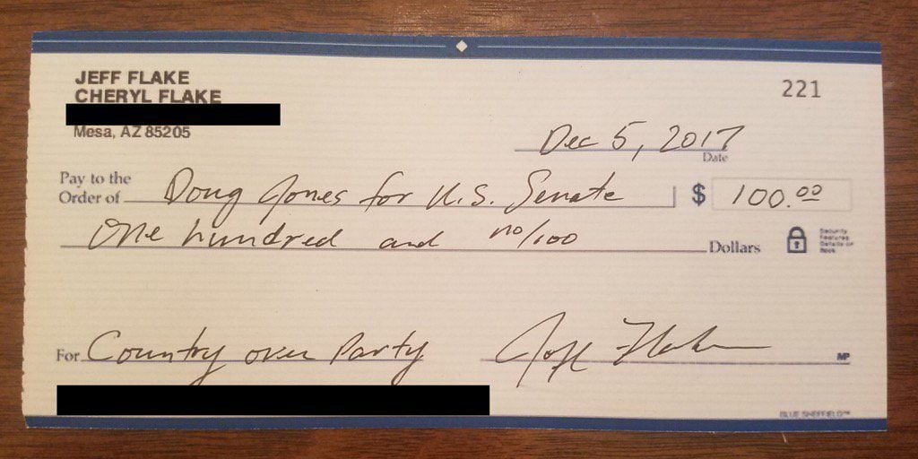 Republican Sen. Jeff Flake sends 100 check to Roy Moore's