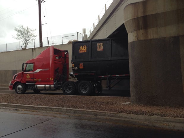 Photo of the day: Truck stuck at underpass