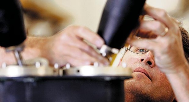 Tucson firm to receive award for collider work  