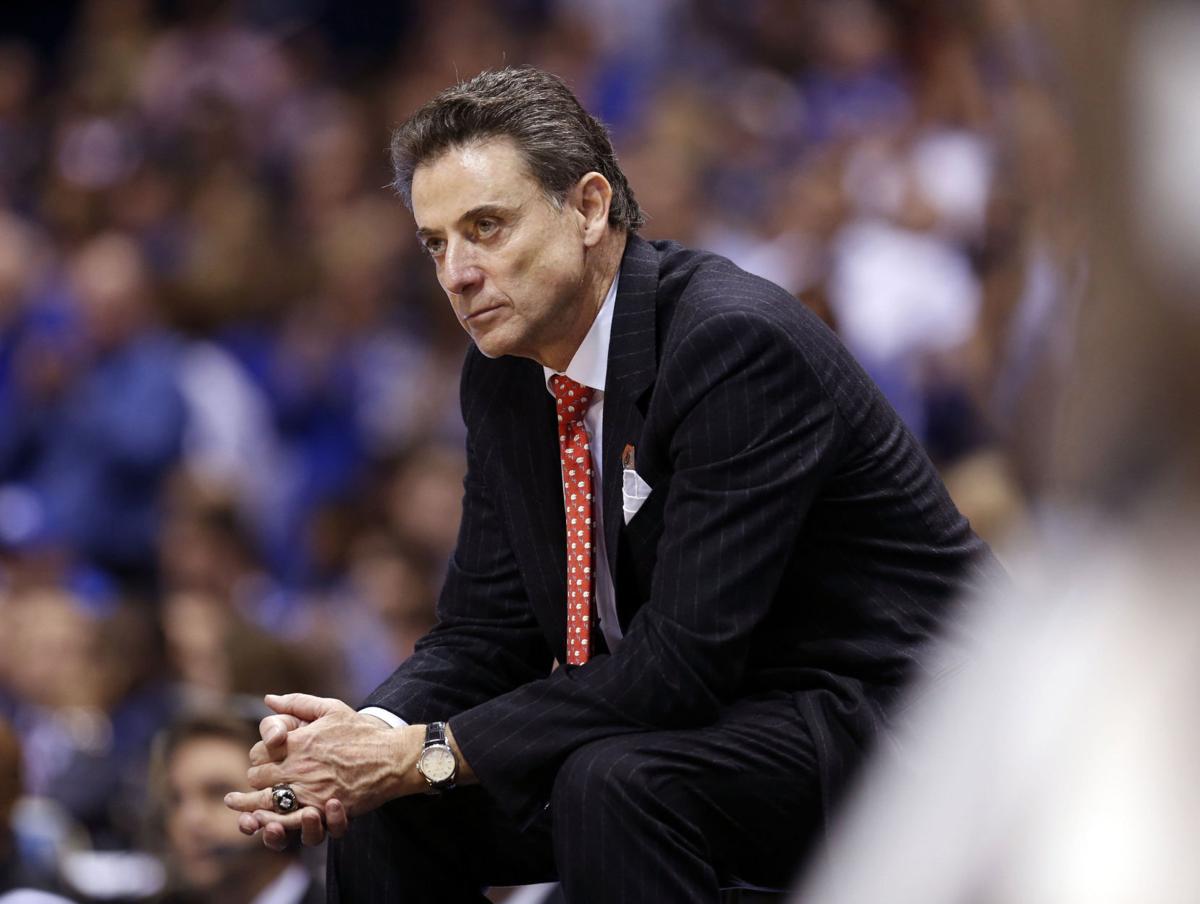 Louisville head coach Rick Pitino late in the second half of a 74-69 loss to Kentucky in the NCAA Tournament's Midwest Region semifinal at Lucas Oil Stadium in Indianapolis on March 28, 2014.