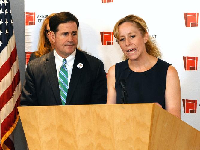 Gov. Doug Ducey and Cara Christ