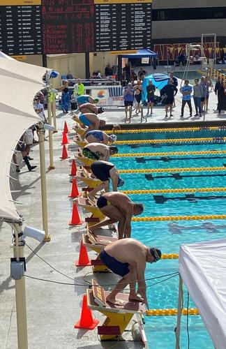 2022-10-30_swimmers_ready_to_start_with_scoreboard-by-Norb-Lyle.jpg