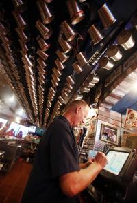 Trident Grill mugs it up since 2004    