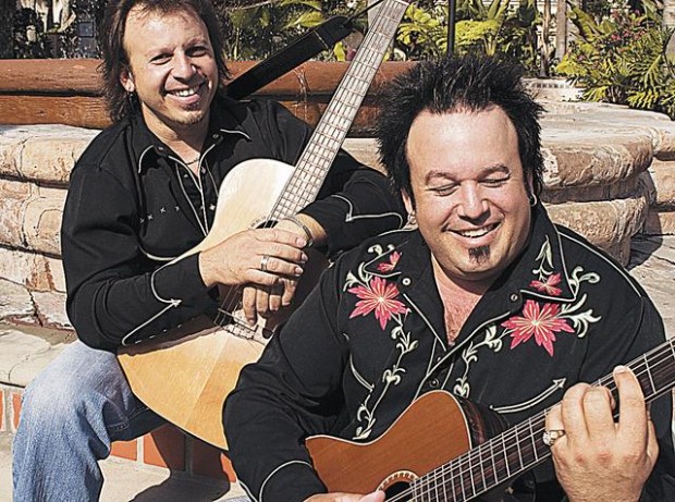 Brothers armed with Spanish guitar  