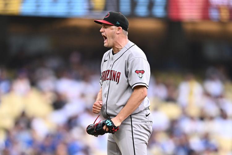 Arizona Diamondbacks pitcher Paul Sewald (38) reacts after striking out Los Angeles Dodgers left fielder Teoscar Hernández (not pictured) during the ninth inning at Dodger Stadium on July 12, 2026.