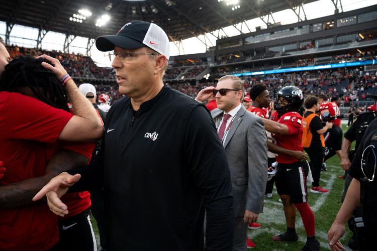 Cincinnati Bearcats head coach Scott Satterfield walks on the field after the football game between Cincinnati Bearcats and