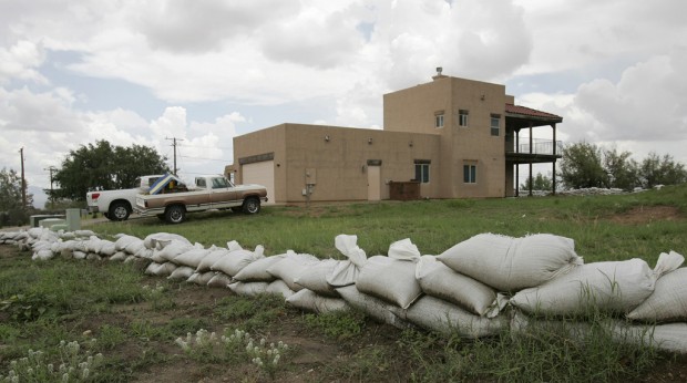 Storm whacks Cochise County; 2 swept away, but they're OK    