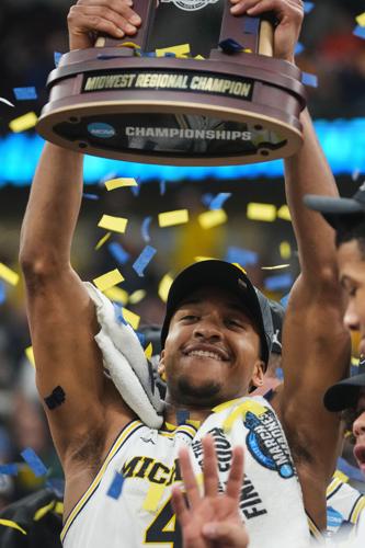 APTOPIX NCAA Tennessee Michigan Basketball