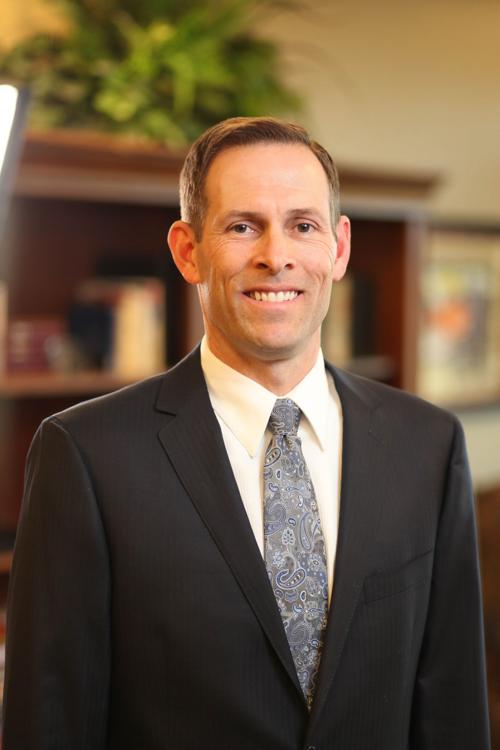 Principal's collaborative nature helps win him award Education