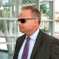 Lawyer seeks to block testimony from wife of indicted ex-Arizona utilities regulator