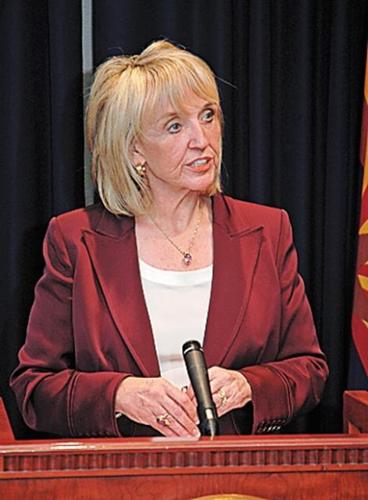 State budget talks stall as suit is threatened  
