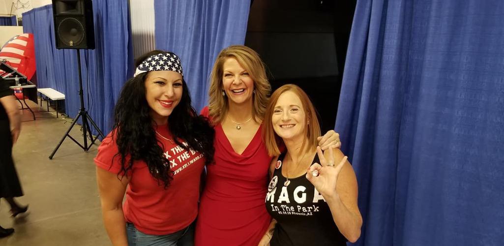 Ducey denounces controversial group days after posing for photo with members