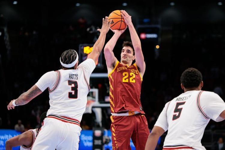 Iowa State forward Milan Momcilovic (22) shoots the ball over Texas Tech forward LeJuan Watts (3) during the 2026 Big 12 tournament at T-Mobile Center in Kansas City, Mo.