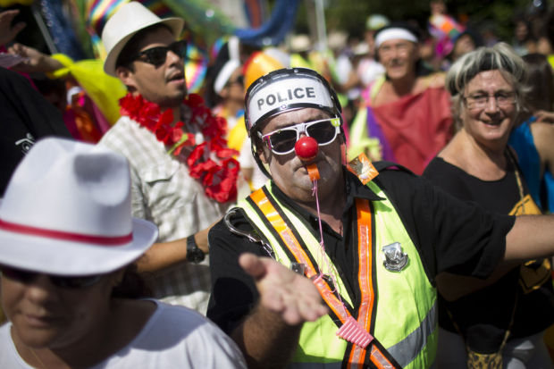 Natives flee, or hide, from Rio's Carnival    