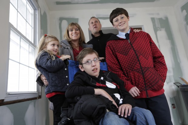 One family's whole new life rises from Sandy's wreckage    