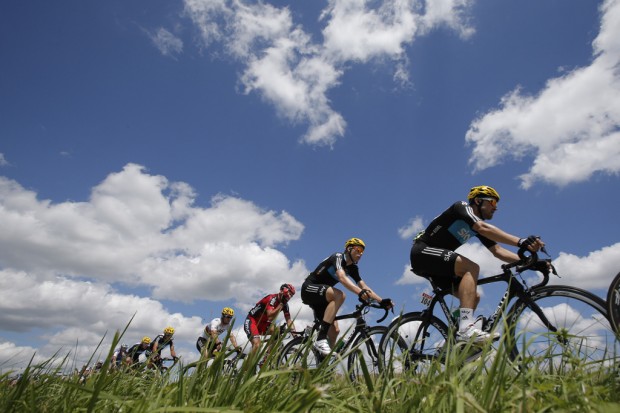 Tour de France: Wiggins' hopes climb as he dons yellow for Brits    