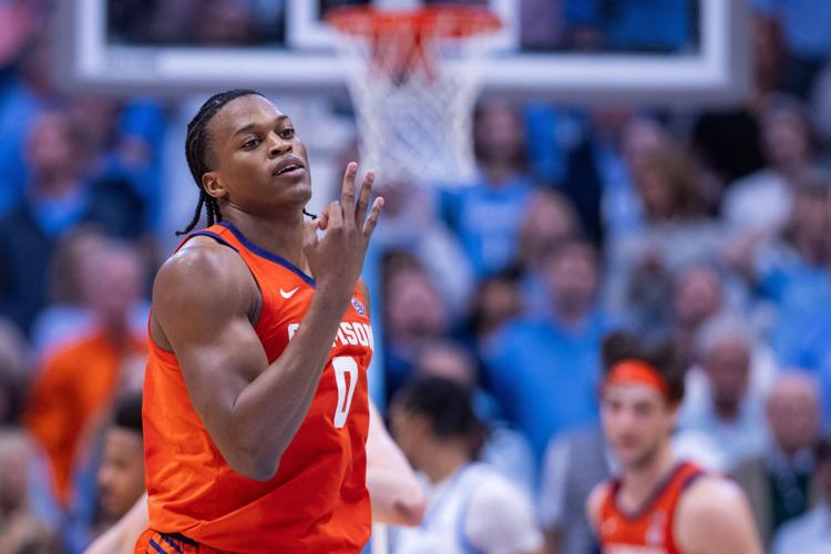 Mar 3, 2026; Chapel Hill, North Carolina, USA; Clemson Tigers forward RJ Godfrey (0) celebrates a three point basket against the North Carolina Tar Heels during the second half at Dean E. Smith Center. Mandatory Credit: Scott Kinser-Imagn Images