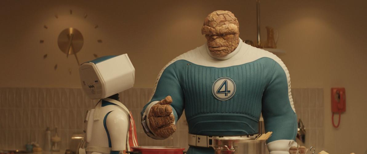 H.E.R.B.I.E and the Thing (Ebon Moss-Bachrach) make dinner in "The Fantastic Four: First Steps."