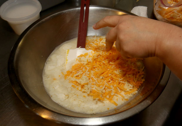 Making arepas, Colombian and Venezuelan bread
