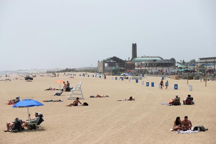 People enjoy the beach in Asbury Park, New Jersey, on June 5, 2019.