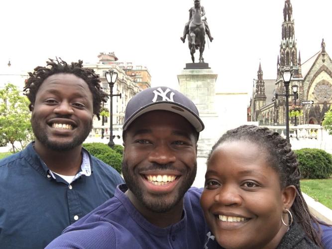 Irvo Otieno with his brother and mother