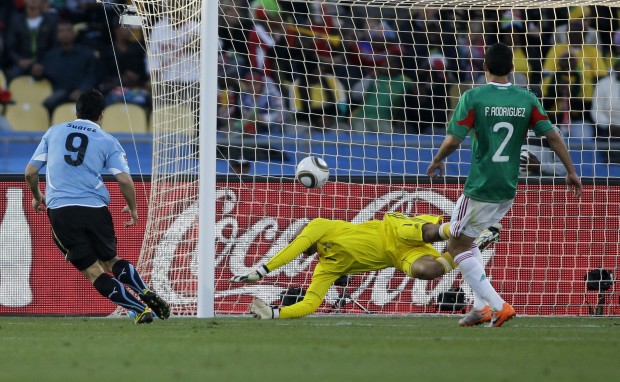 Mexico advances despite loss   