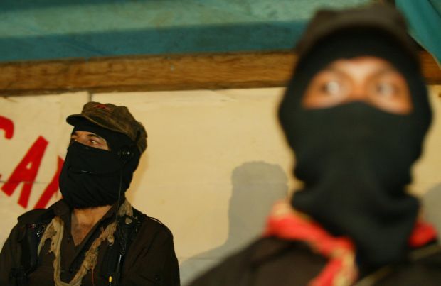 Subcomandante Marcos (L), leader of the