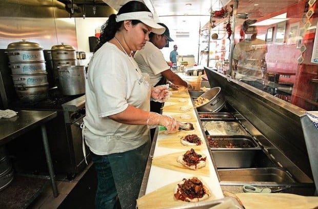 East Broadway strip mall seeks identity, prosperity  