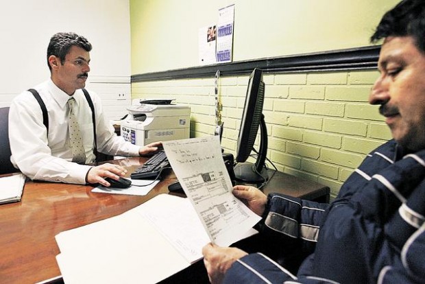 Migrants crowding into tax filing  