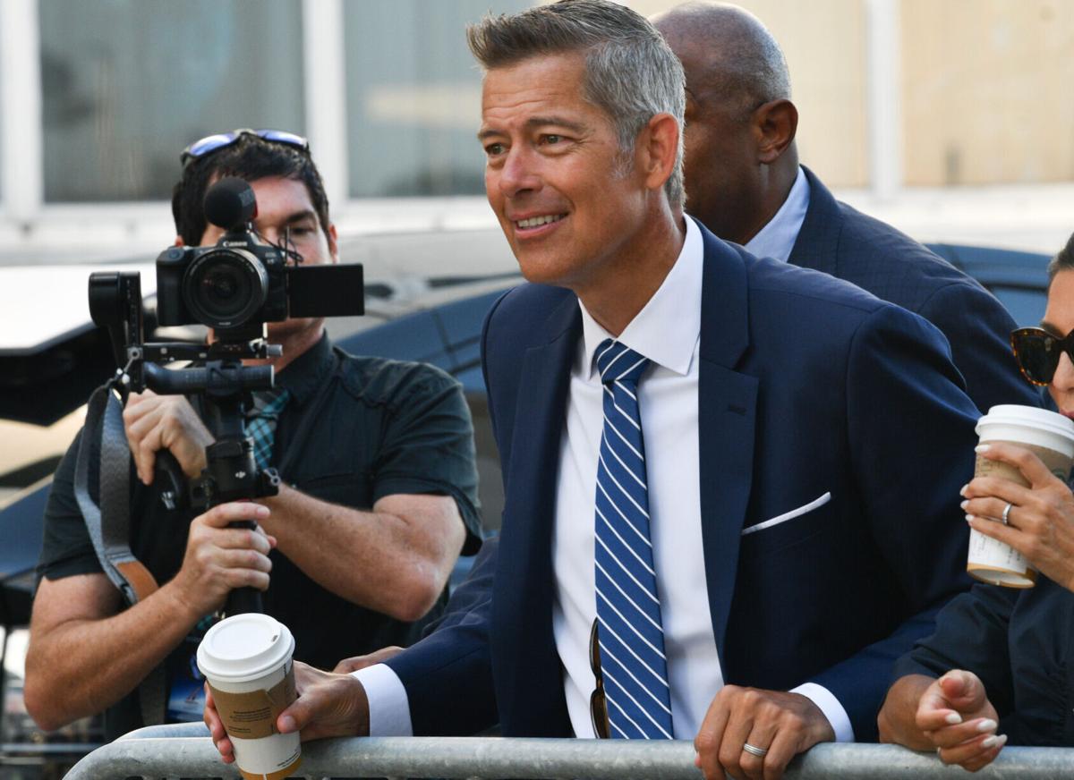 Transportation Secretary Sean Duffy talks with family members of NASA's Space X Crew-11 before they leave crew quarters at Kennedy Space Center on July 31, 2025.