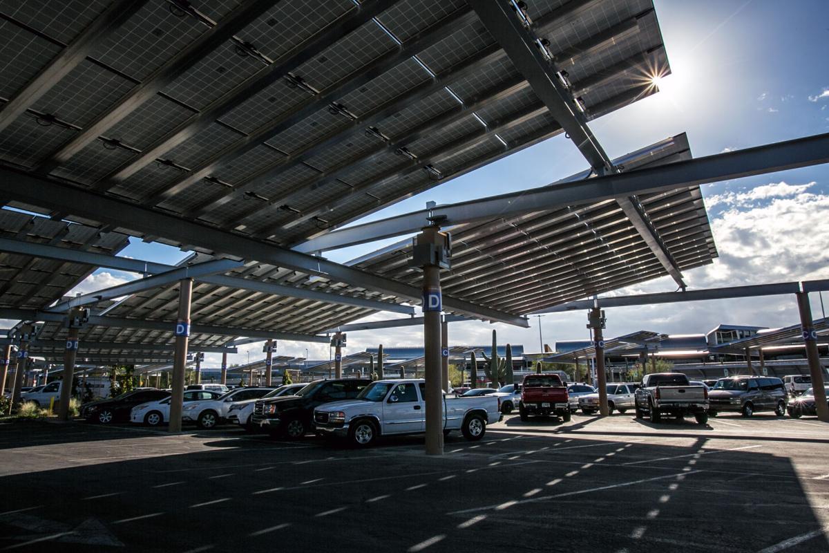 Tucson Airport Marks Completion Of Iconic Solar Array Business The Sun Ks Out From Corner Of Completed Photovoltaic Array Project Over Hourly And Daily Parking Lots At Tucson International Airport On