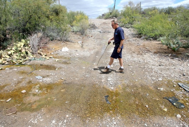 In dry country, this 'cop' lays down the law on folks who waste water   