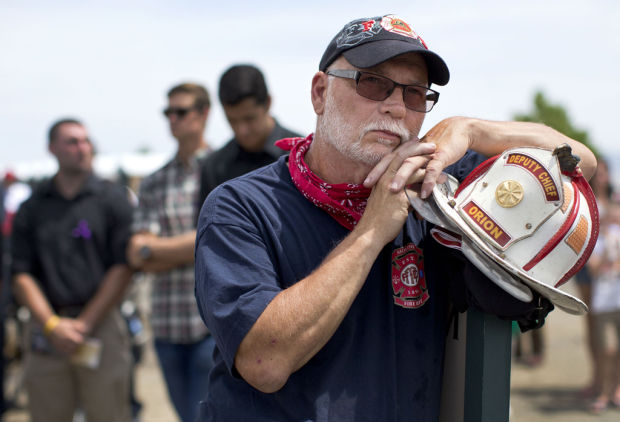 20th hero transfixes crowd Biden also joins memorial for 19 hotshots    