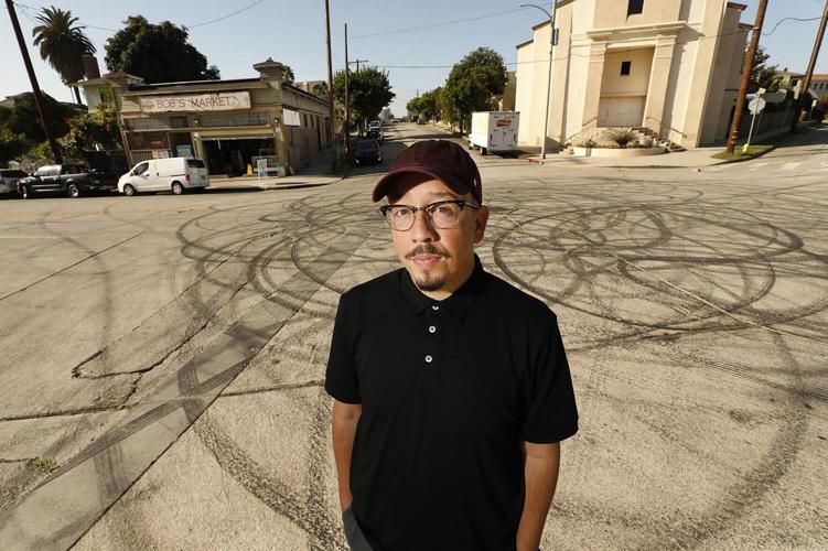 Author and entertainment journalist Shea Serrano, whose new book "Movies" collects fun essays about movies that become jumping off points for wider cultural conversations and curiosities photographed at Toretto's Market in the Angelino Heights neighborhood from The Fast& the Furious film, on Oct. 4, 2019.