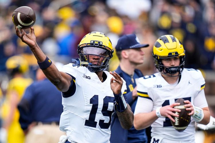 Michigan quarterback Bryce Underwood (19) warms up before the spring game at Michigan Stadium in Ann Arbor on Saturday, April 18, 2026.