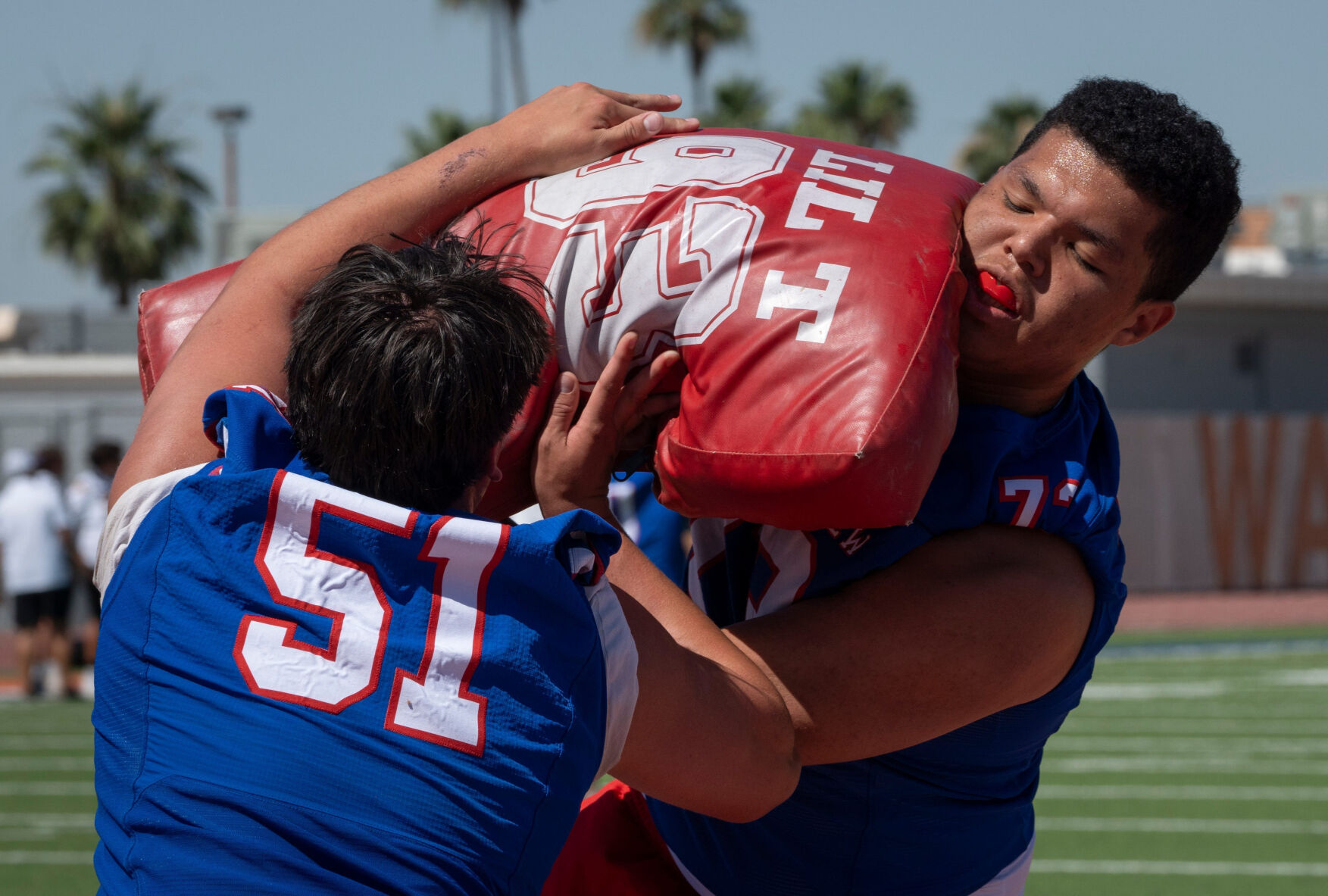 Mountain View OL Tye Kennedy (right, No. 73) runs a drill during Mesa Public Schools spring football showcase, on May 6, 2026.