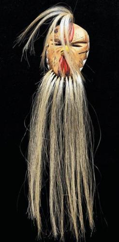 Masks reveal the maker's inner self (w/slide show and video)  