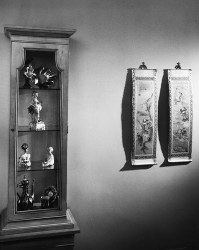 A remodeled home filled with art and antiques