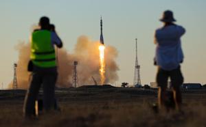 Russia sends American, two cosmonauts to space station